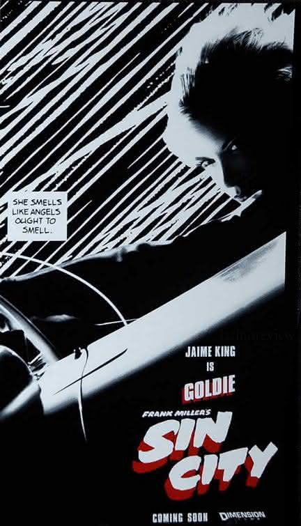 Jamie King como Goldie em Sin City Goldie