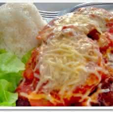 bife_parmegiana O da minha mãe também ficou mais bonito.